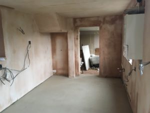 Space for new kitchen leading into playroom